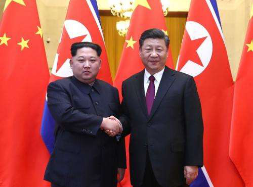 习总书记和金正恩委员长在北京会晤